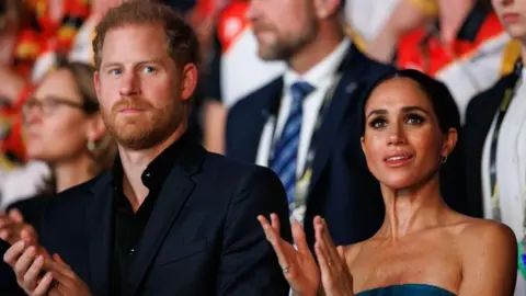 Getty Images Prince Harry, Duke of Sussex and Meghan, Duchess of Sussex are seen during the closing ceremony of the Invictus Games Düsseldorf 2023