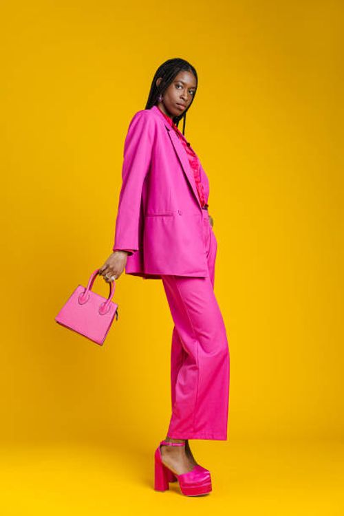 fashionable woman in pink suit - woman suit model stock pictures, royalty-free photos & images
