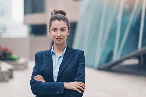 young businesswoman - professional woman in suit stock pictures, royalty-free photos & images
