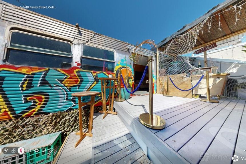 Love Train — neon-pink themed train carriage event space at Trainscendence