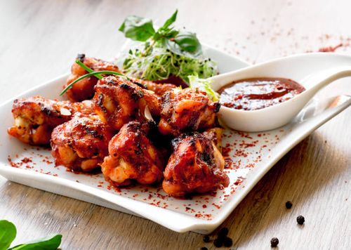 grilled chicken wings - chicken wing stock pictures, royalty-free photos & images