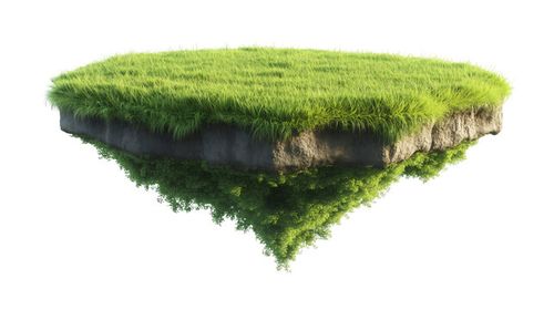 Piece of land covered with green grass floating in the air with a transparent background