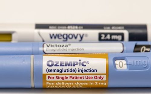 Still life closeup of injectable peptides, Ozempic, Victoza and Wegovy.