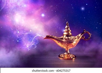 Magic genie lamp with smoke on a dark background Stock Photo