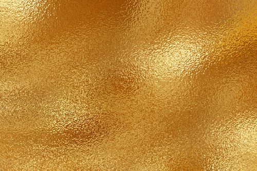 Gold texture. Golden background with effect metallic foil. Speckles gold material. Speckled glitter backdrop. Abstract shiny pattern. Shine metal plate for design invitation, cards, prints. Vector