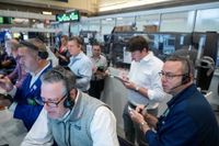 US stocks hover near their latest record in mixed trading on Wall Street - AP News