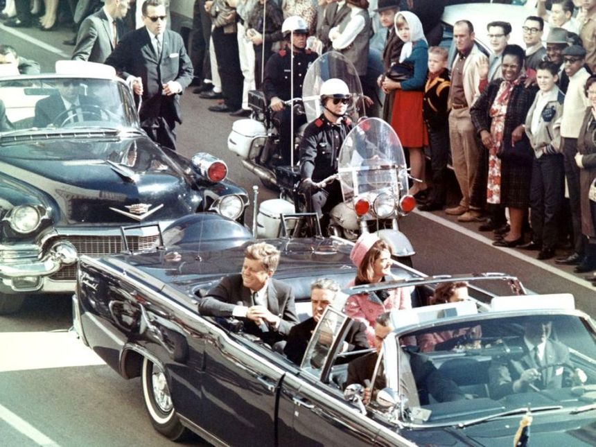 President John F. Kennedy in his motorcade in Dallas on the day of the assassination.