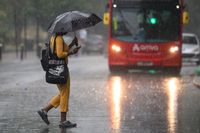 Met Office extends UK weather warning as thunderstorms batter southern England | The Independent
