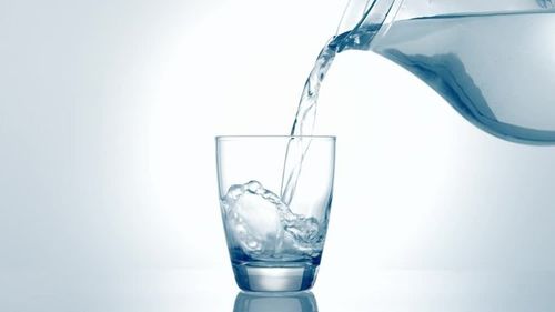 Water pouring into glass
