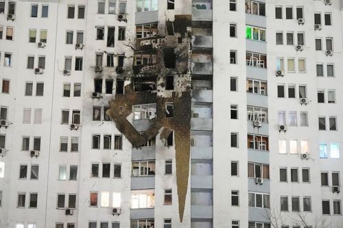 A residential building is seen damaged after a Russian strike in Kyiv, Ukraine, Friday, Jan. 9, 2026. (AP Photo/Efrem Lukatsky)