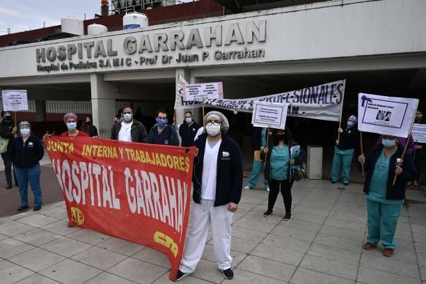 Health workers of the Dr. Juan Garrahan pediatric hospital protest demanding better protection gear and salaries in Buenos Aires, Argentina, on...