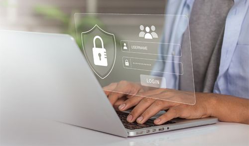 Person typing on a laptop with a virtual login interface overlay showing username, password fields, and a padlock icon.