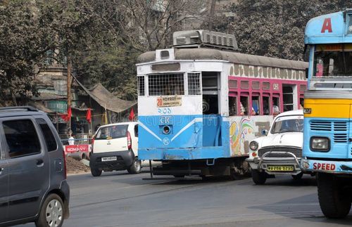 Traditional tram downtown Kolkata on February 08, 2014. Kolkata is the only Indian city with a tram network, which is operated by the Calcutta Tramways Comp. Kolkata tram stock images, royalty-free photos and pictures