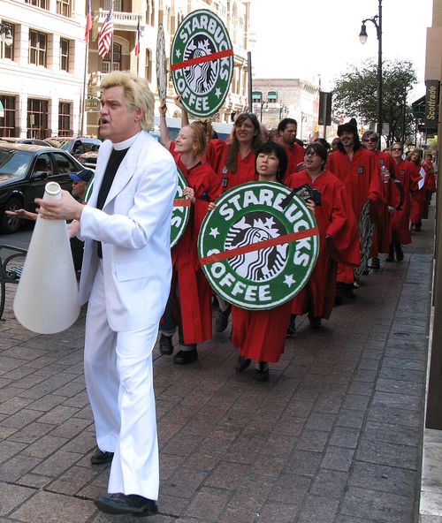 reverend billy protesting against starbucks