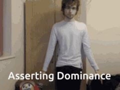 a man in a white shirt with the words asserting dominance written below him