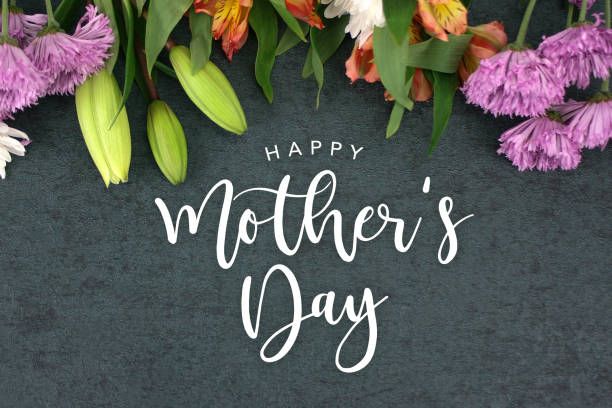 Happy Mother's Day calligraphy holiday script over dark blackboard background with beautiful colorful white, pink, orange, purple and green flower blossom bouquet decoration Spring season still life with Happy Mother's Day calligraphy holiday celebration script over dark blackboard background with beautiful colorful white, pink, orange, purple and green flower blossom bouquet decoration happy mothers day stock pictures, royalty-free photos & images