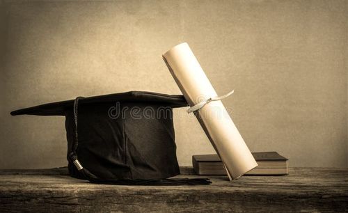 Graduation cap, hat with degree paper on wood table Empty ready for your product display or montage. Bachelors degree stock images, royalty-free photos and pictures