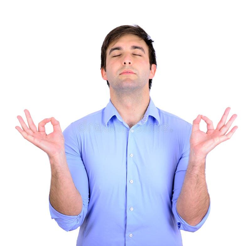 Hombre joven en modo del zen de la meditación fotografía de archivo libre de regalías