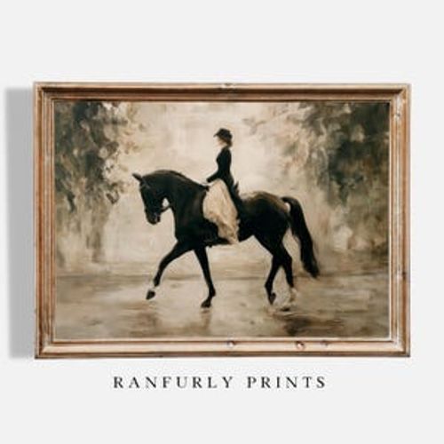 May include: A framed vintage-style print depicts a person riding a black horse. The rider wears a dark coat and hat with a light-colored skirt. The artwork has a muted color palette with the text "RANFURLY PRINTS" at the bottom.