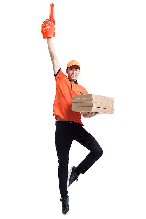 年轻的披萨送餐员跳跃图片下载