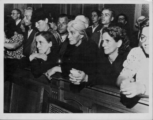 The packed public gallery at a war trial in liberated Holland following World War Two, Netherlands, circa 1945.