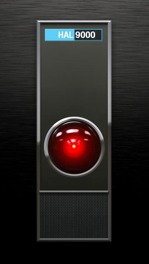 a red button on a black wall with the words hal 9000 written below it