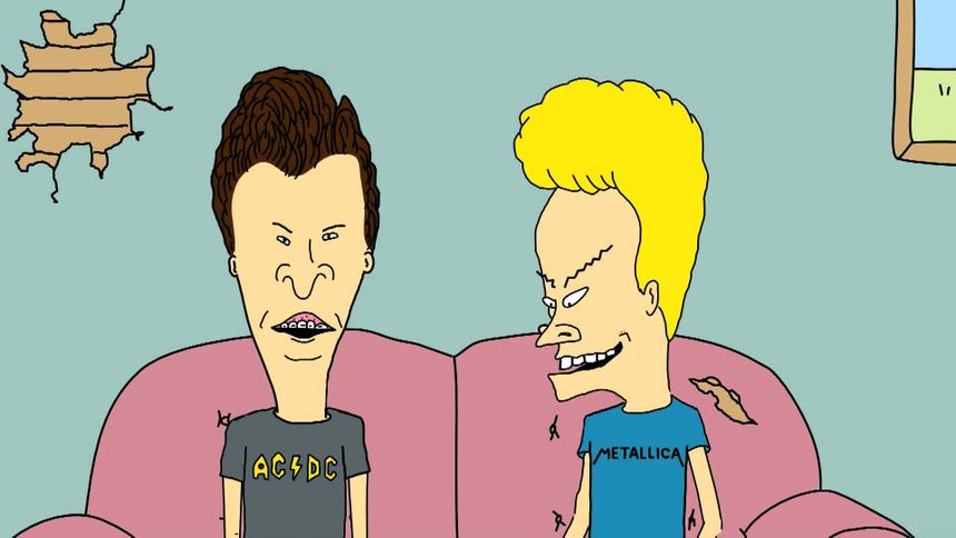 Two Cartoon Characters Sitting On A Couch