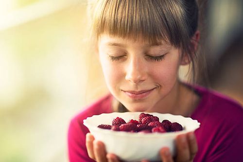 portrait of a little girl with raspberries. - sweet aroma stock pictures, royalty-free photos & images