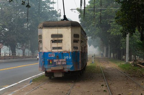 Kolkata, West Bengal, India - 23rd January 2020 : Electric Tram is passing through tram lines at Kolkata maidan area. It is the only tram system operating in India and oldest in Asia, 100 years old. Kolkata tram stock images, royalty-free photos and pictures