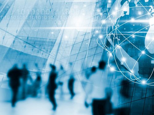 A bustling city street with diverse people walking, showcasing the interconnectedness of the world.