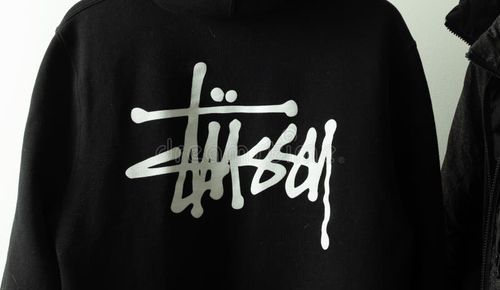 Moscow, Russia - 5 December 2020: Stussy clothes logo on black hoodie, Illustrative Editorial. Stussy logo stock images, royalty-free photos and pictures