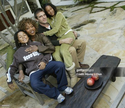 Actress Alfre Woodard with her husband Roderick Spencer and their children Duncan Spencer (left) and