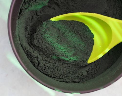 spirulina powder - spirulina powder spoon stock pictures, royalty-free photos & images