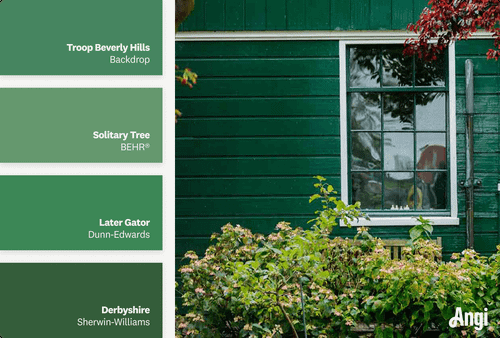 Side of emerald green house, including different tones of emerald green paint