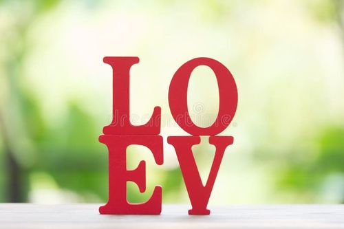 Wooden letters word `LOVE` with Wooden Letter L,O,V and E on wooden table, use for Valentine day background. Letter l love stock images, royalty-free photos and pictures