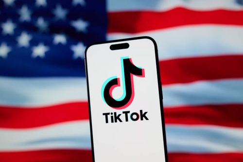 The TikTok app and logo are seen on a mobile device in this illustration photo taken in Warsaw, Poland on 14 January, 2025.