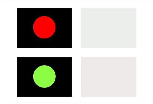 Color contrasts in lighting design: Red and green on black, white tones as design elements.