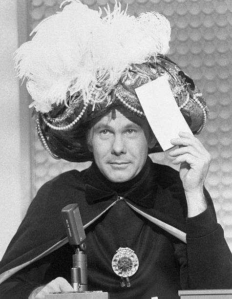Johnny Carson plays the part of "Carnac the Magnificent" during an episode of The Tonight Show with Johnny Carson.