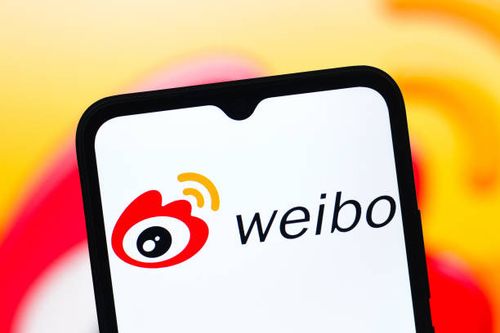 In this photo illustration, the Sina Weibo logo is seen displayed on a smartphone screen.