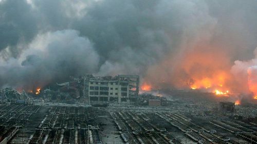 Cars at used car lot utterly devastated by explosion