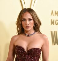 Jennifer Lopez Stuns in Delicate Crêpe Dress and Wide-Brim Sunhat at Wimbledon - instyle.com