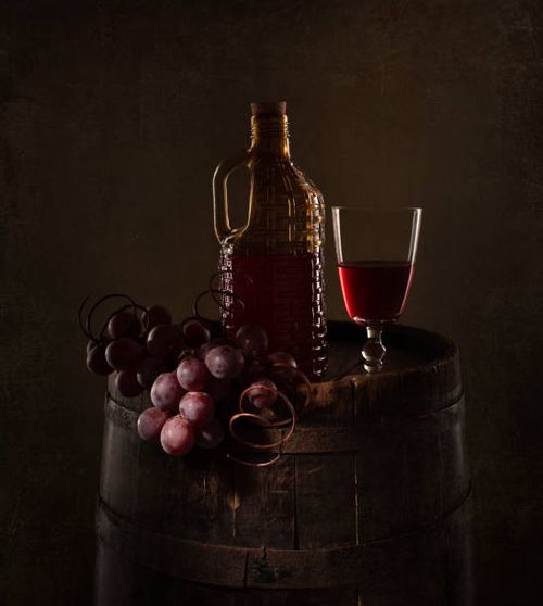 vintage still life close-up of grapes and wine bottle on table,brazil - wine-colour stock pictures, royalty-free photos & images