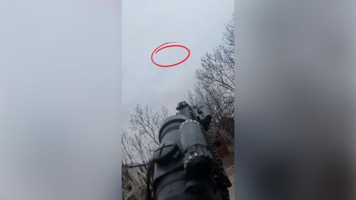 A Ukrainian soldier targets a Russian drone near Kostiantynivka, Donetsk. [National Police of Ukraine]