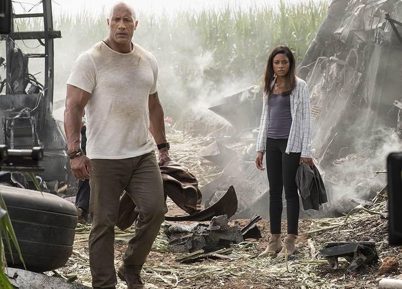 Naomie Harris and Dwayne Johnson in Rampage (2018)