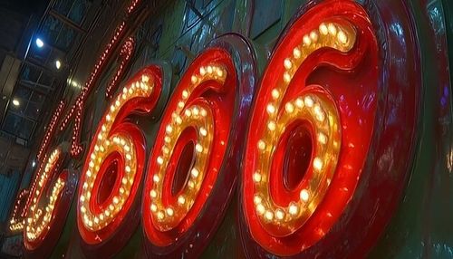 Illuminated 666 Sign, City Night