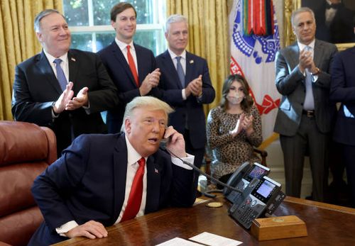 President Donald Trump speaks with Israeli Prime Minister Benjamin Netanyau on the phone about a Sudan-Israel peace agreement, in the Oval Office on...