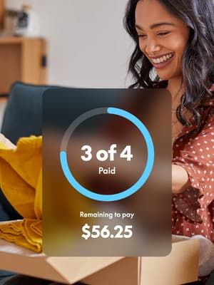 Woman unboxing a yellow shirt, with an instalment payment overlay