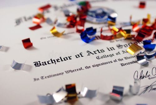 Celebrating Receiving a College Degree. Bachelors degree stock images, royalty-free photos and pictures