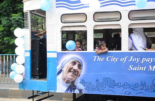 The tram decorated with Saint Mother Teresa’s pictures, posters, texts to mark canonization of Mother Teresa in front of Mother House, on September...