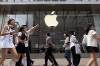 Apple's iPhone shipments to China surged in April. Jim Cramer says there's more to the story